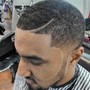 Men's haircut and black fibers