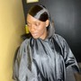 Sleek pony tail on relaxed hair.