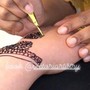 Henna Tattoo on Hand with Stencil