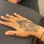 Henna tattoo on hand free hand design