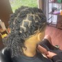 Kid's Feedin Braids into a ponytail