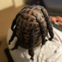 Tribal/ cornrow at the top, knotless in back