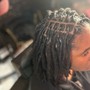 Kid's loc retwist