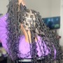 Boho medium knotless braids tail bone length