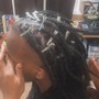 Haircut with loc re-twist