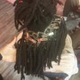 One strand (book if you don’t have locs)