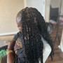 Hair extensions added to locs