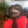 Cornrows with added hair