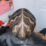 Men corn rolls/stitch braids half of head