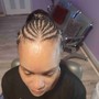 Feeding  corn rolls braids