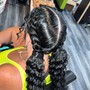 2 cornrows braided to the back or off the side