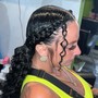 2 cornrows braided to the back or off the side