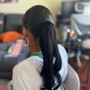 Sleek ponytail with added hair