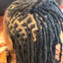 Dreadlocks retwist (two strand twist style)