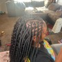 Fulani sew in