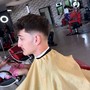 Kid’s haircut (12 and under)