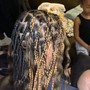 Cornrows/stitch braids