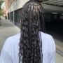 2 single cornrow’s braids