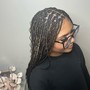 Cornrow feedinBraids