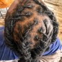 Sister locs retwist