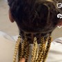 Medium knotless braids.