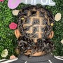 Kid’s feed in ponytail