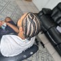 Men cornrow with design (shave sides)