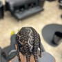 Design Cornrows or stitch braids