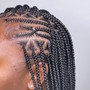 Cornrows in front Single braids in the back