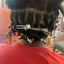 Loc retwist and style