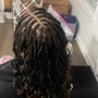 Waist length braids or twists