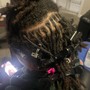 Loc retwist and style