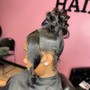 Sleek pony tail on relaxed hair.