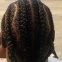 Cornrows with added hair