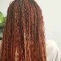 Medium Senegalese twists(mid-back length)