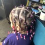 Dread retwist with style