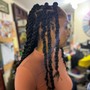 Twists adding in kinky or braiding hair