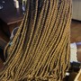 Medium large knotless braids