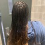 2 strands twisted on Natural Hair