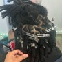 One strand ( Book if you don’t have locs)