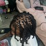 One strand twist ( book if you have locs )