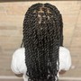 High/low braided ponytail