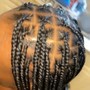 Men braided styled Cornrows