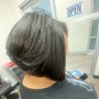 Relaxer with more than 1 inch new growth, trim and style