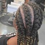 Cornrows/feed-in braids