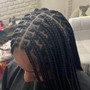 Cornrows on natural hair(no extension added and no stitsh. Up to 10 to 12 braids )